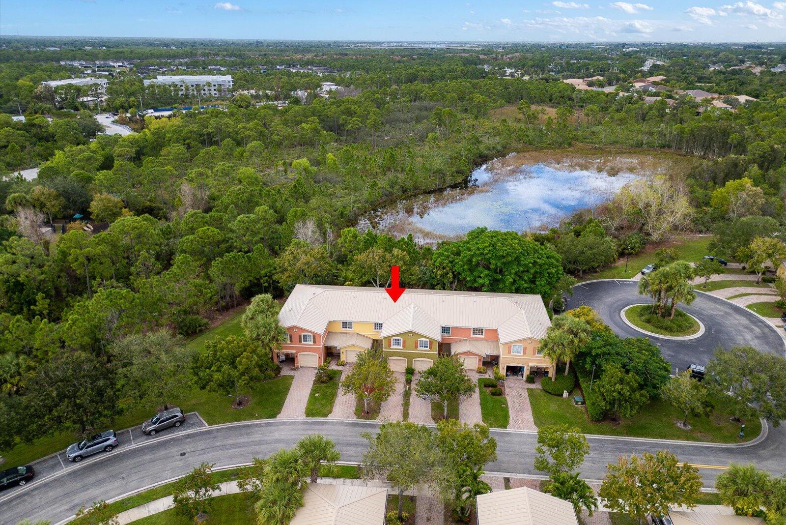 5290 Southeast Mitchell Lane Stuart, FL 34997 - Photo 33 of 44 an aerial view of residential houses with outdoor space and river
