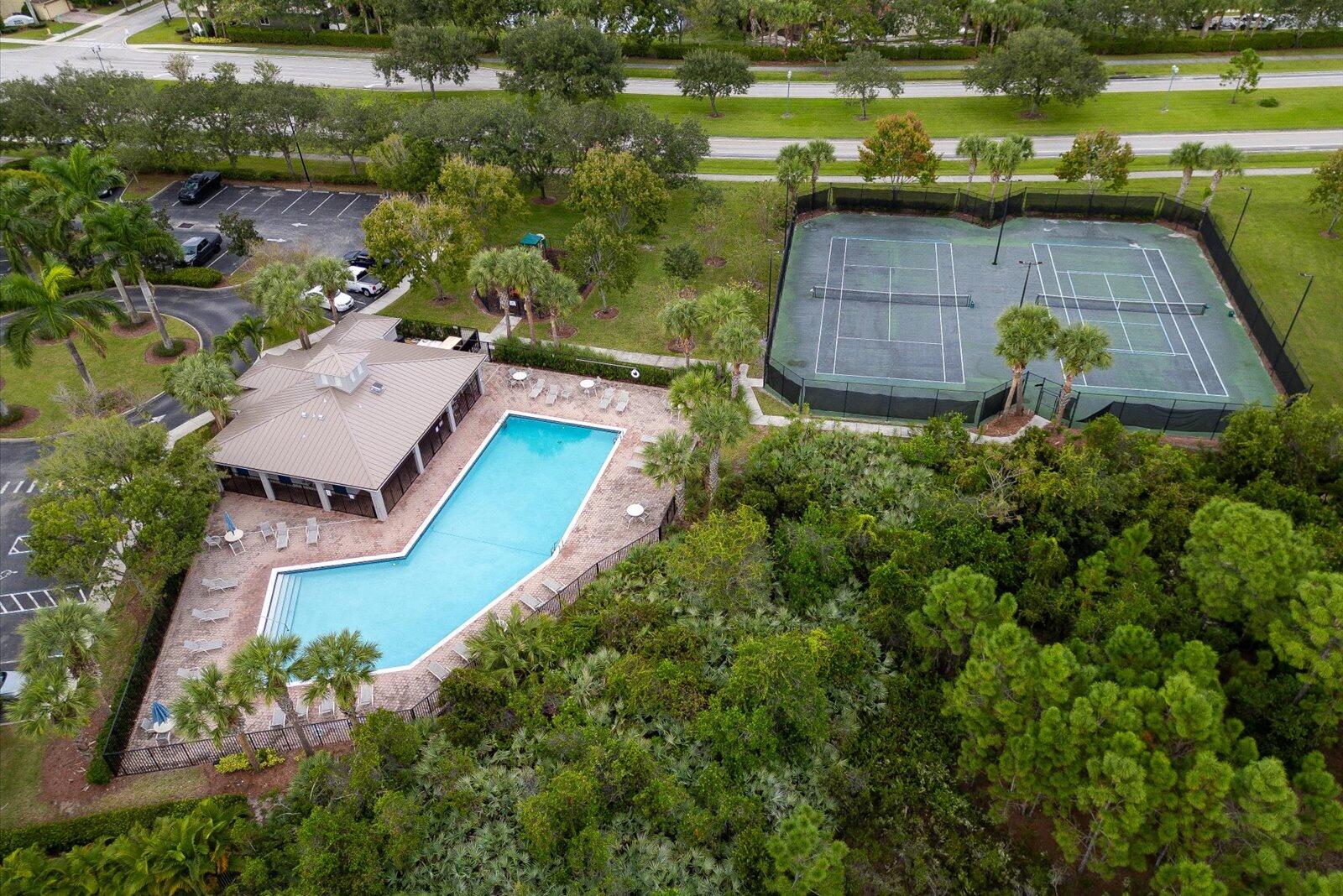 5290 Southeast Mitchell Lane Stuart, FL 34997 - Photo 39 of 44 an aerial view of a house with a yard and lake view