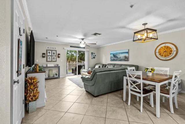 a living room with furniture and a table