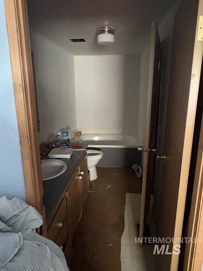 111 Throop Street Colfax, WA 99111 - Photo 5 of 10 Bathroom with vanity and a tub to relax in