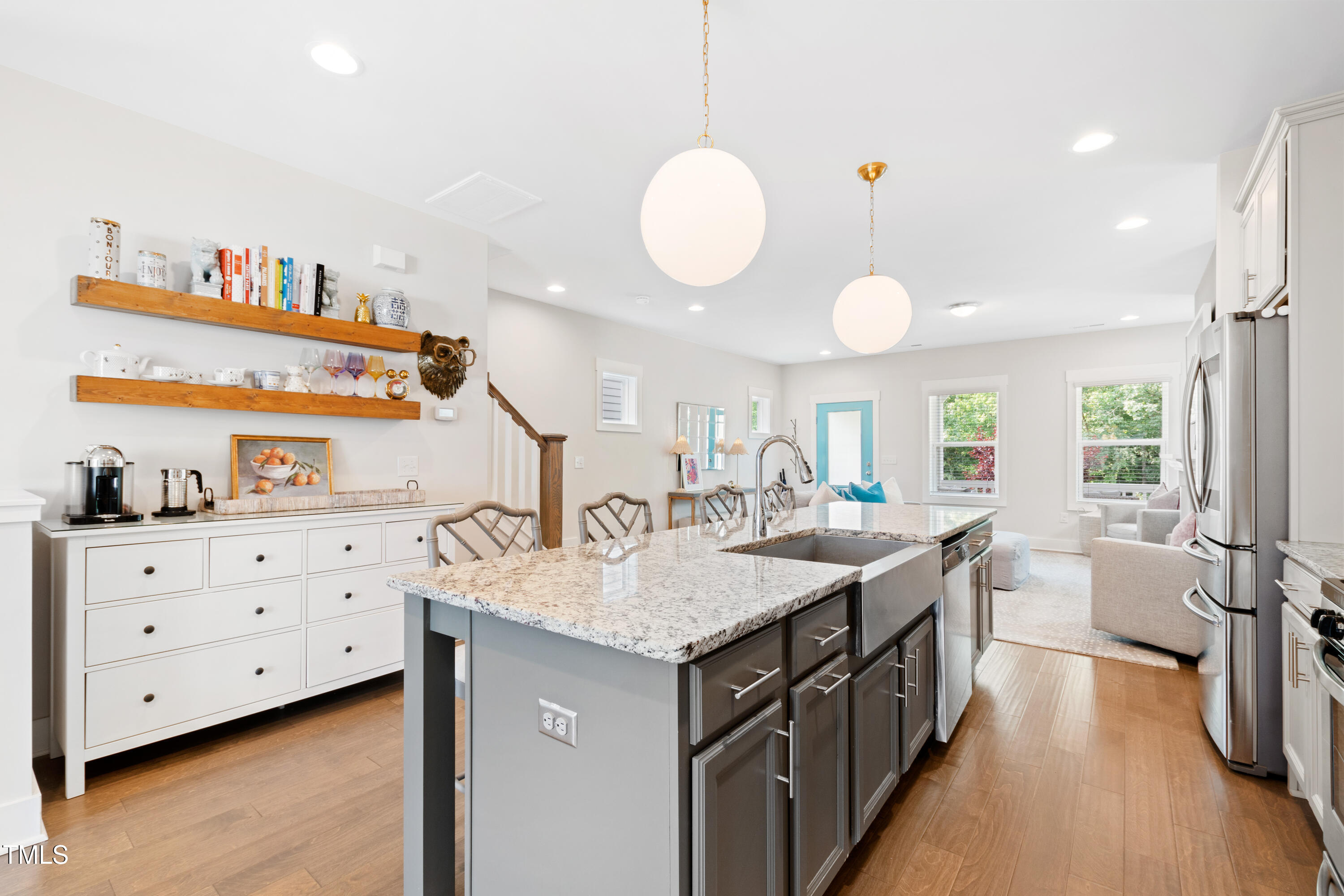 71 Hawk Point Road Chapel Hill, NC 27516 - Photo 11 of 35 a kitchen with a stove and a wooden floor