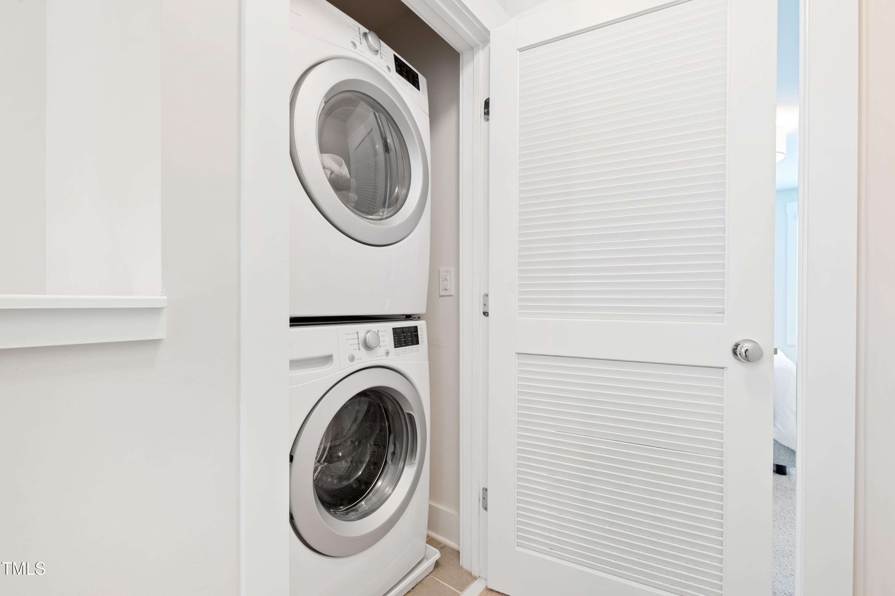 71 Hawk Point Road Chapel Hill, NC 27516 - Photo 16 of 35 a utility room with dryer and washer
