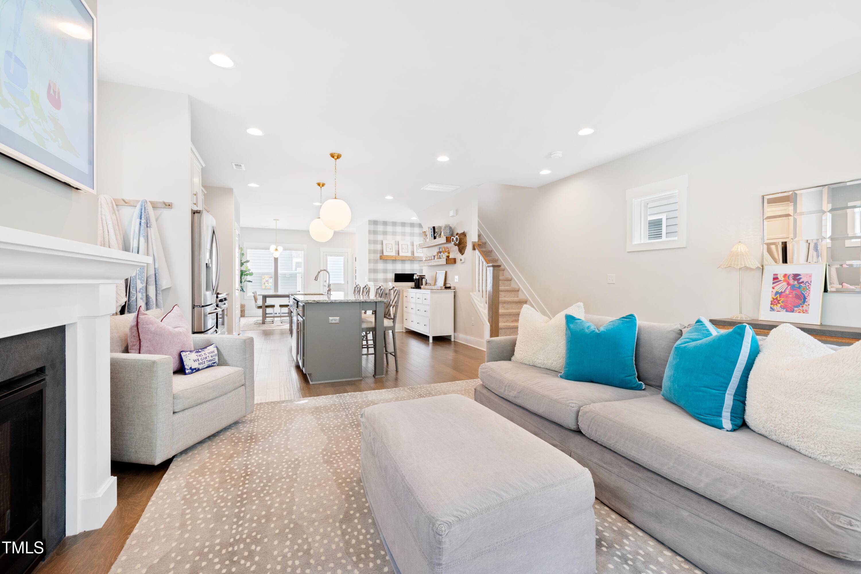 71 Hawk Point Road Chapel Hill, NC 27516 - Photo 17 of 35 a living room with furniture and a fireplace
