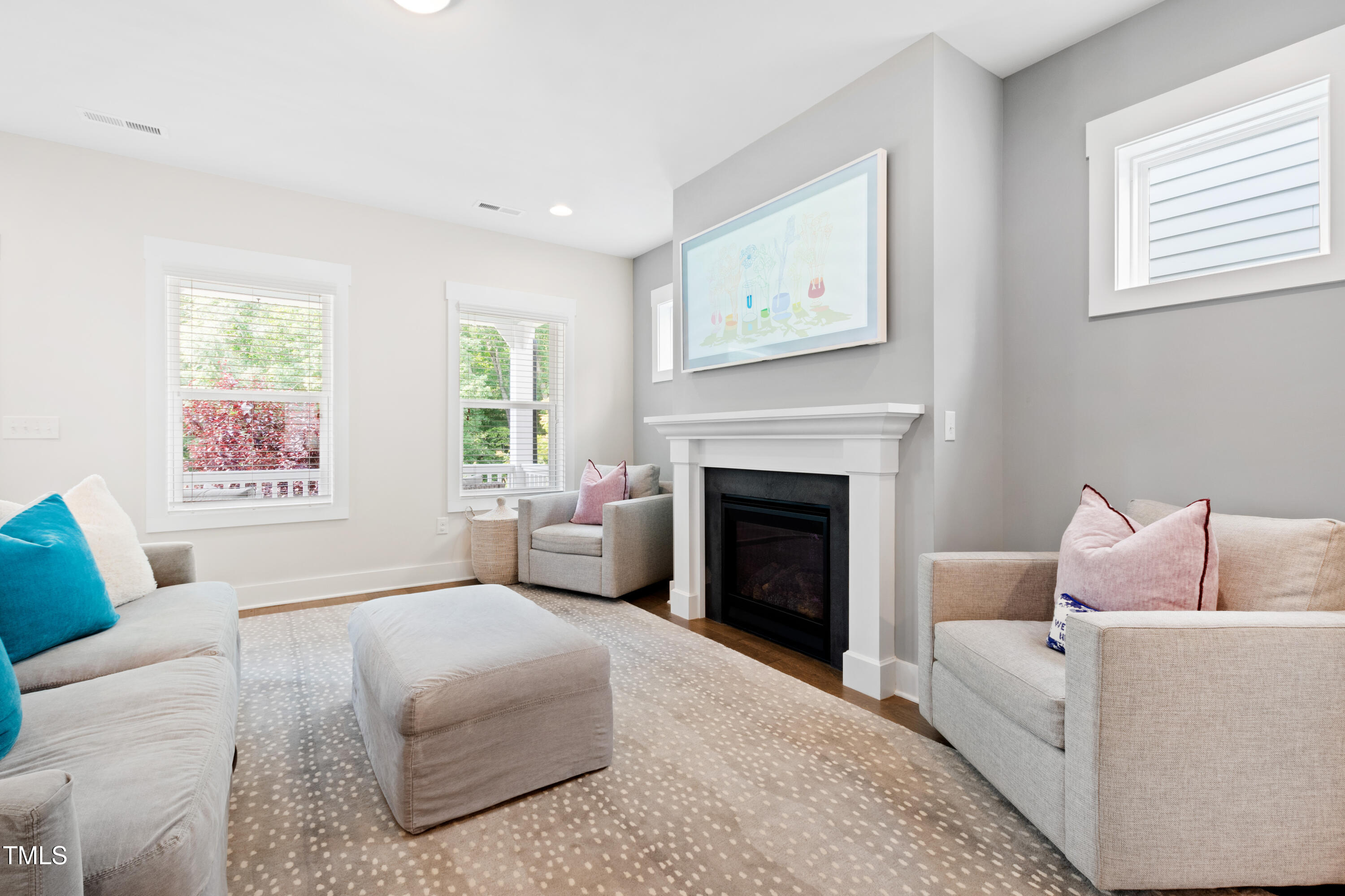 71 Hawk Point Road Chapel Hill, NC 27516 - Photo 18 of 35 a living room with furniture and a fireplace