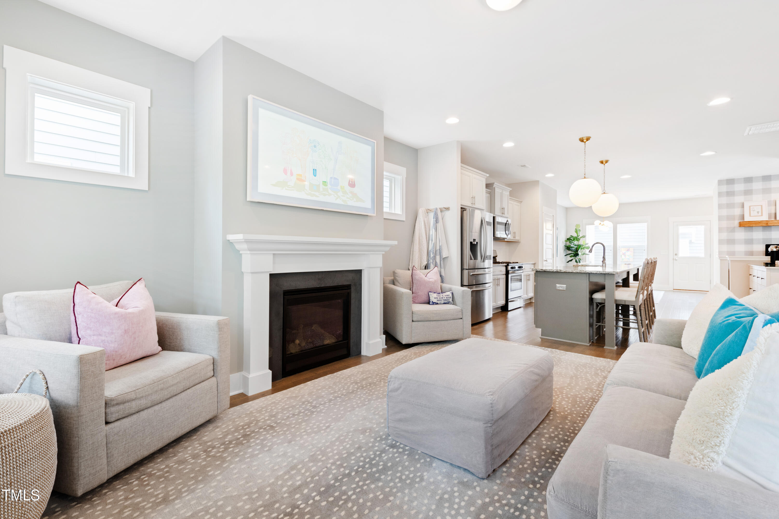 71 Hawk Point Road Chapel Hill, NC 27516 - Photo 20 of 35 a living room with furniture and a fireplace