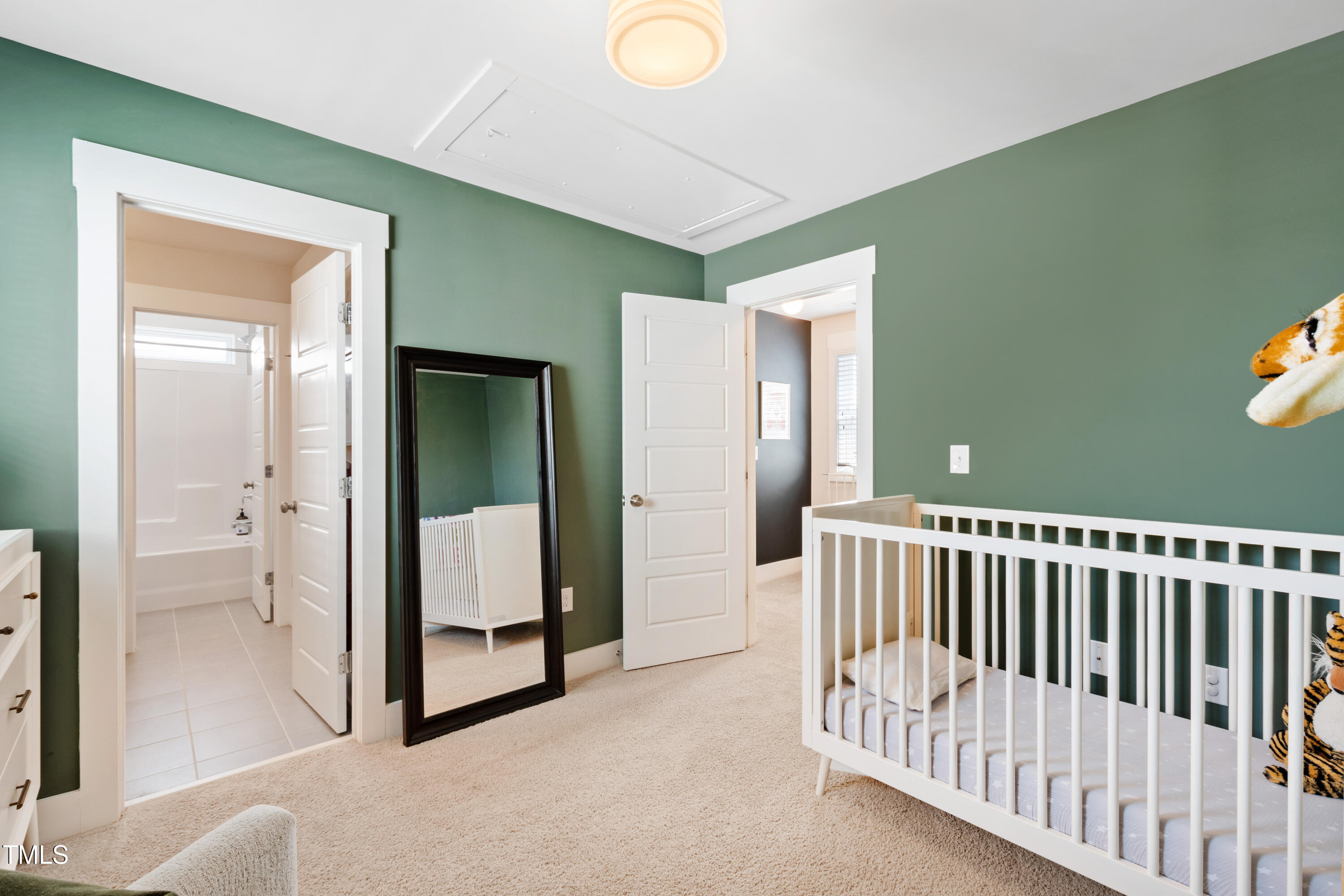 71 Hawk Point Road Chapel Hill, NC 27516 - Photo 25 of 35 a view of a room with sliding door and stairs