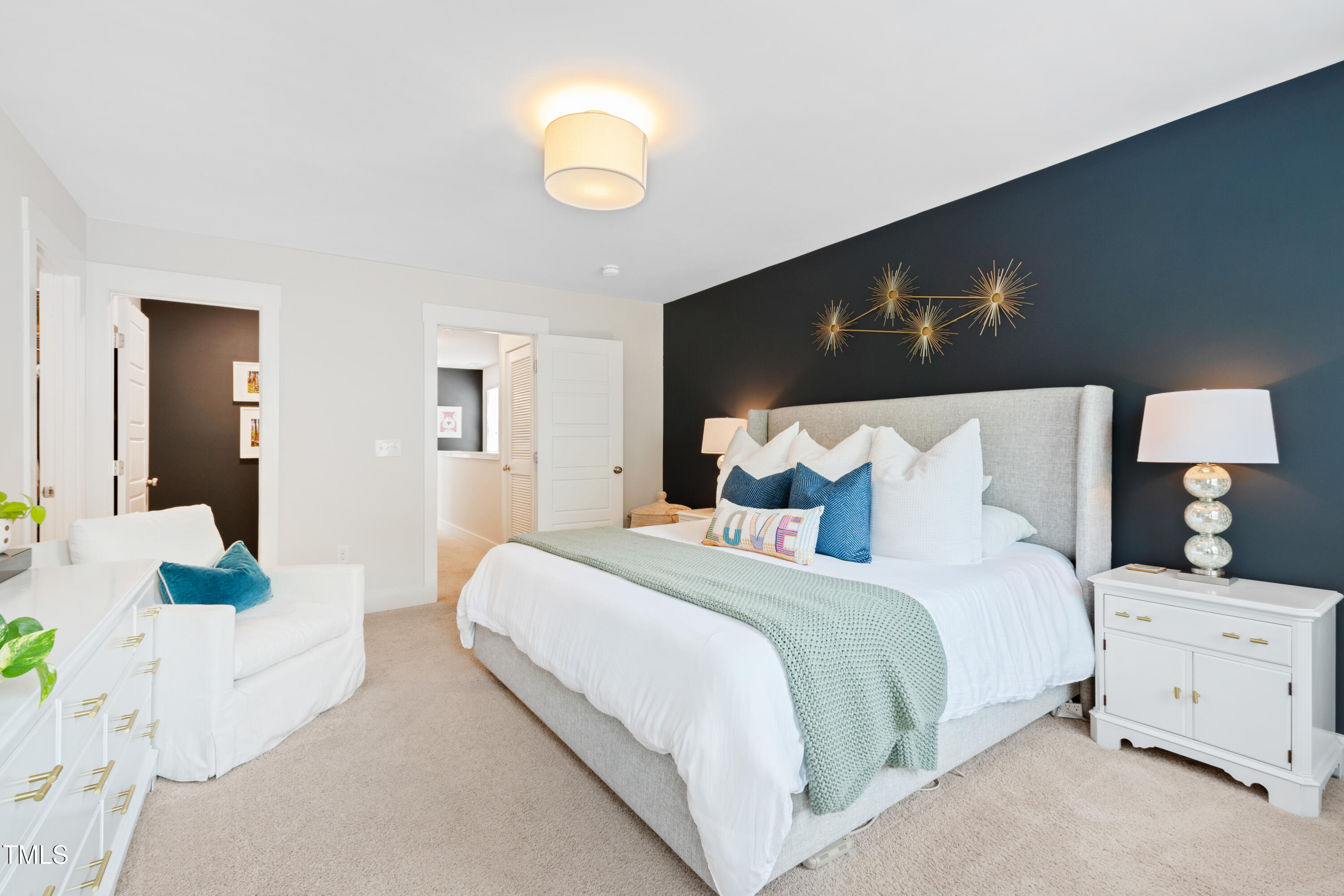 71 Hawk Point Road Chapel Hill, NC 27516 - Photo 27 of 35 a bedroom with bed and a night stand