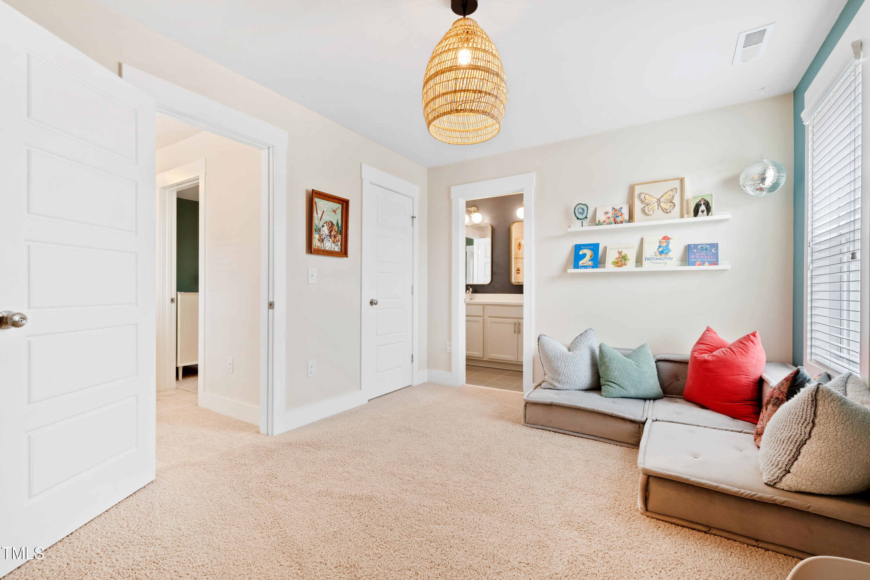 71 Hawk Point Road Chapel Hill, NC 27516 - Photo 28 of 35 a living room with furniture and a window
