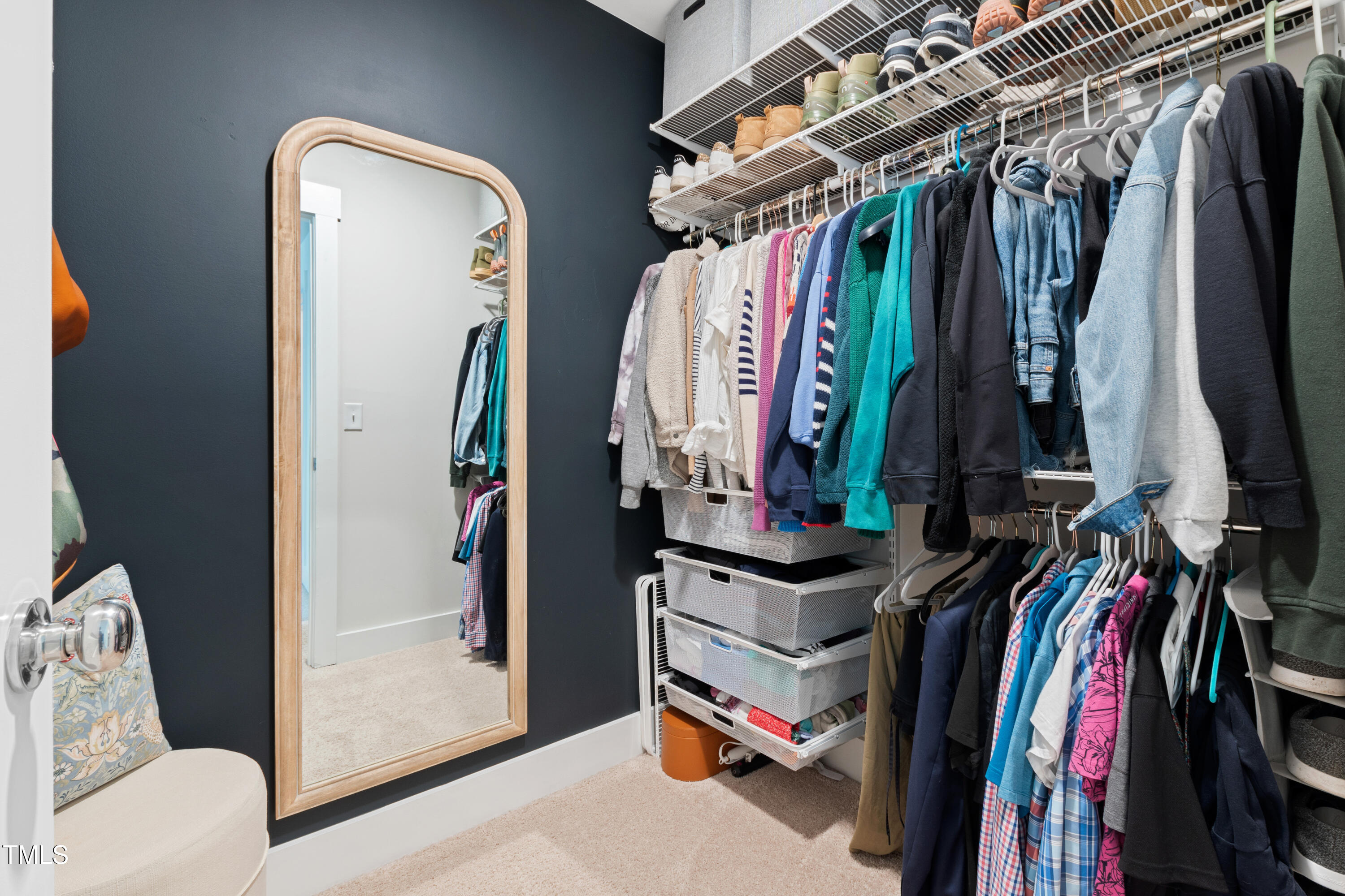71 Hawk Point Road Chapel Hill, NC 27516 - Photo 30 of 35 a view of walk in closet with clothes and shoes