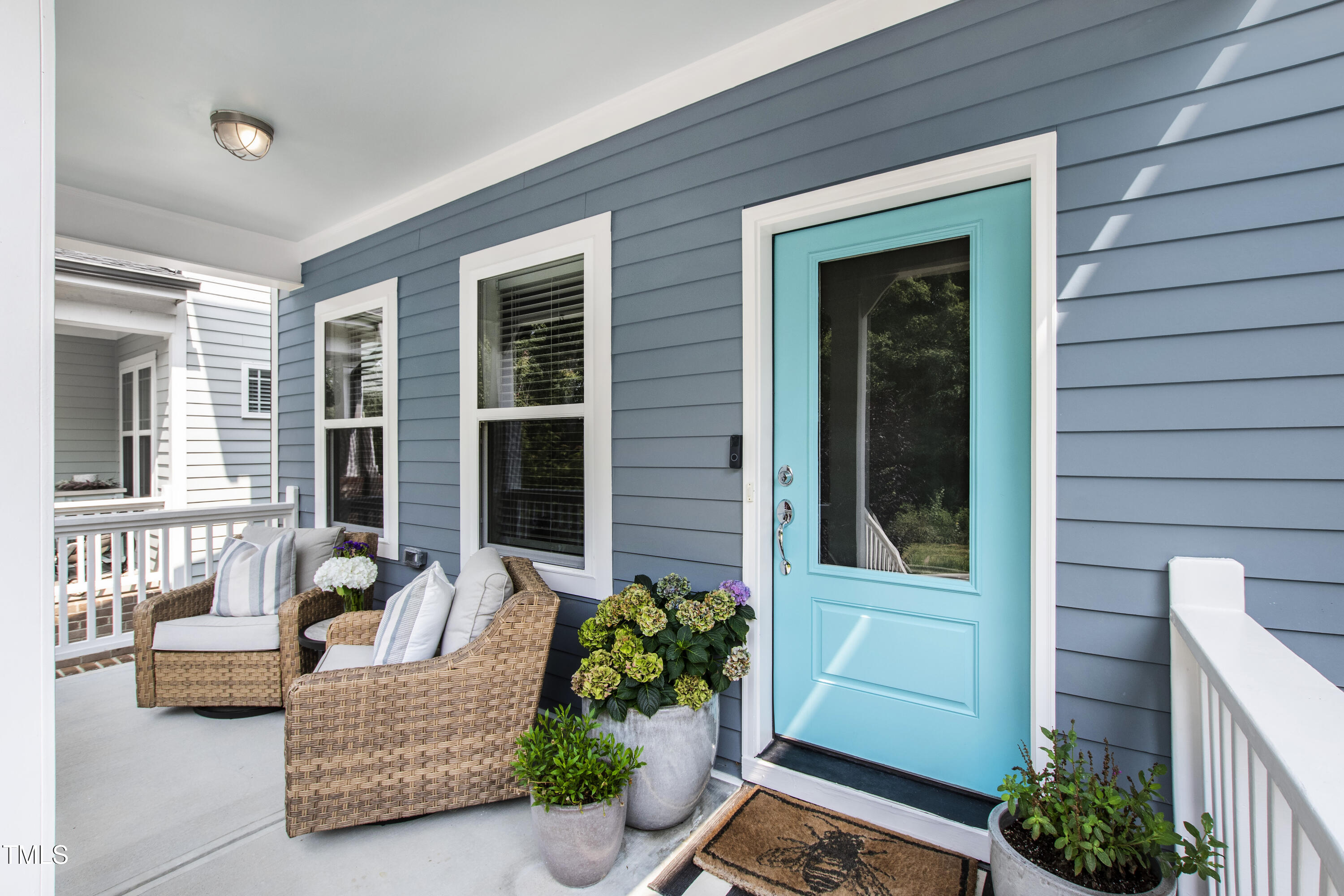 71 Hawk Point Road Chapel Hill, NC 27516 - Photo 3 of 35 a view of a two couches in the patio