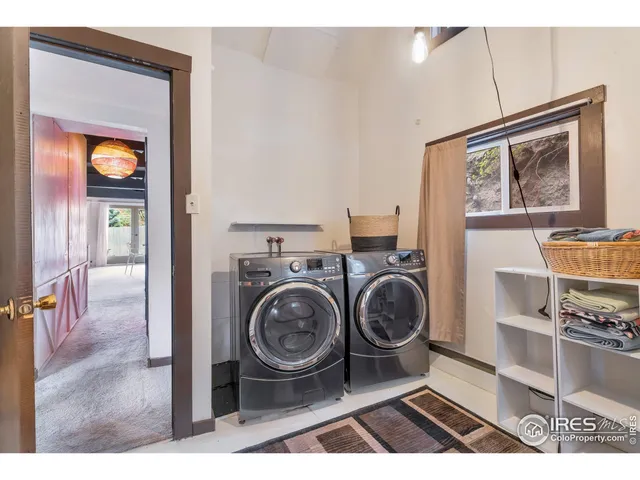 a view of a backyard with a wooden fence