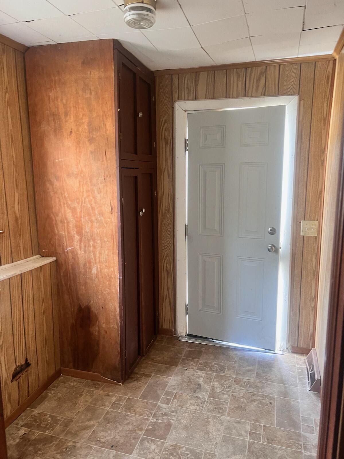 1618 Read Mountain Road Northeast Roanoke, VA 24019 - Photo 11 of 11 a view of an empty room with wooden door