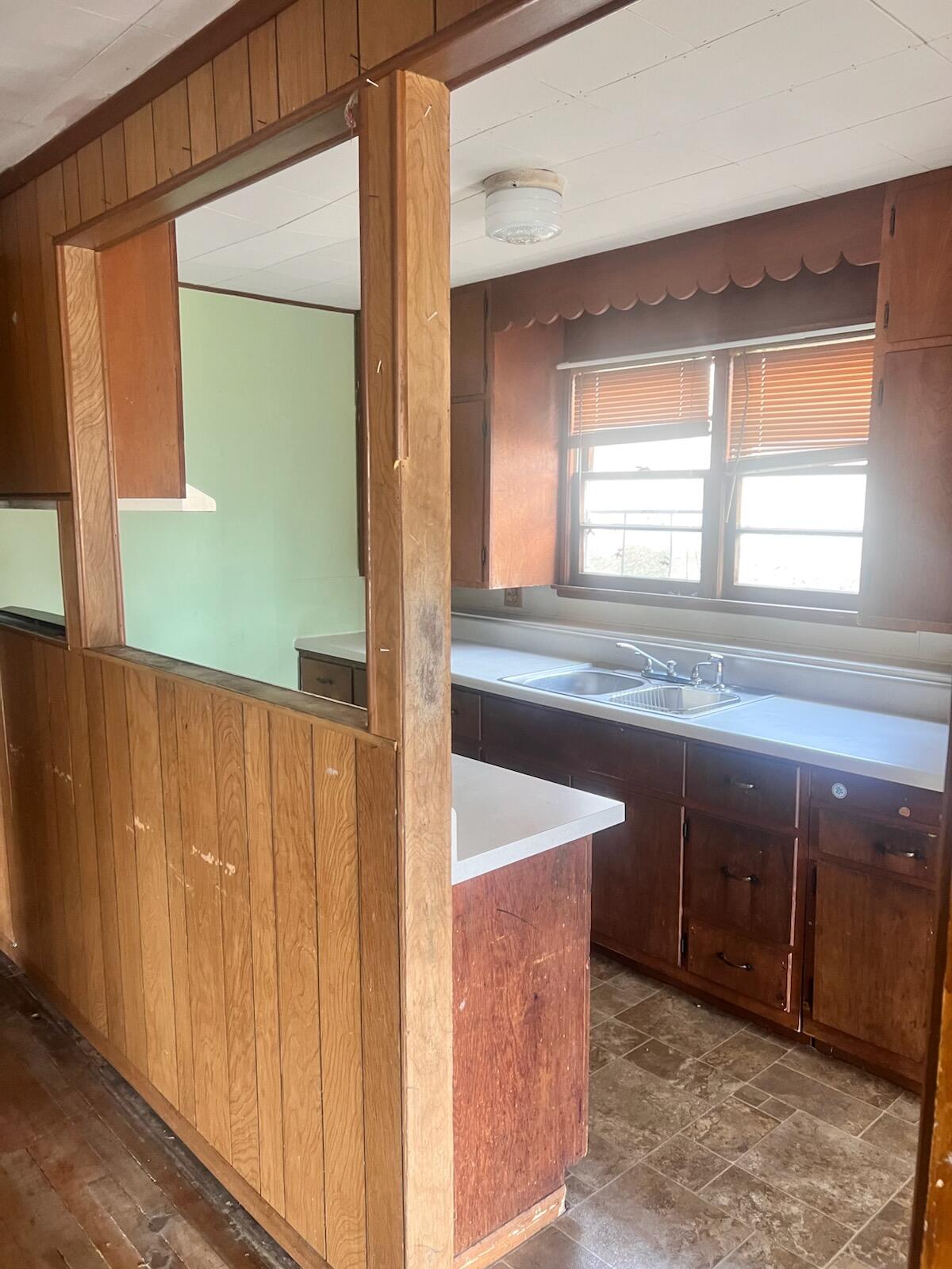 1618 Read Mountain Road Northeast Roanoke, VA 24019 - Photo 2 of 11 a view of a kitchen with a sink and a window