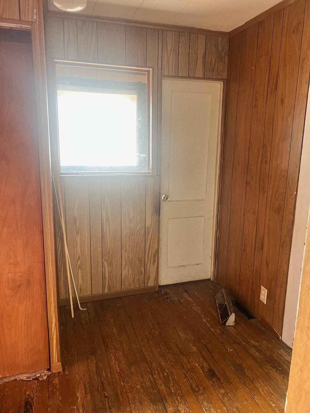 1618 Read Mountain Road Northeast Roanoke, VA 24019 - Photo 3 of 11 a view of a utility room with wooden floor
