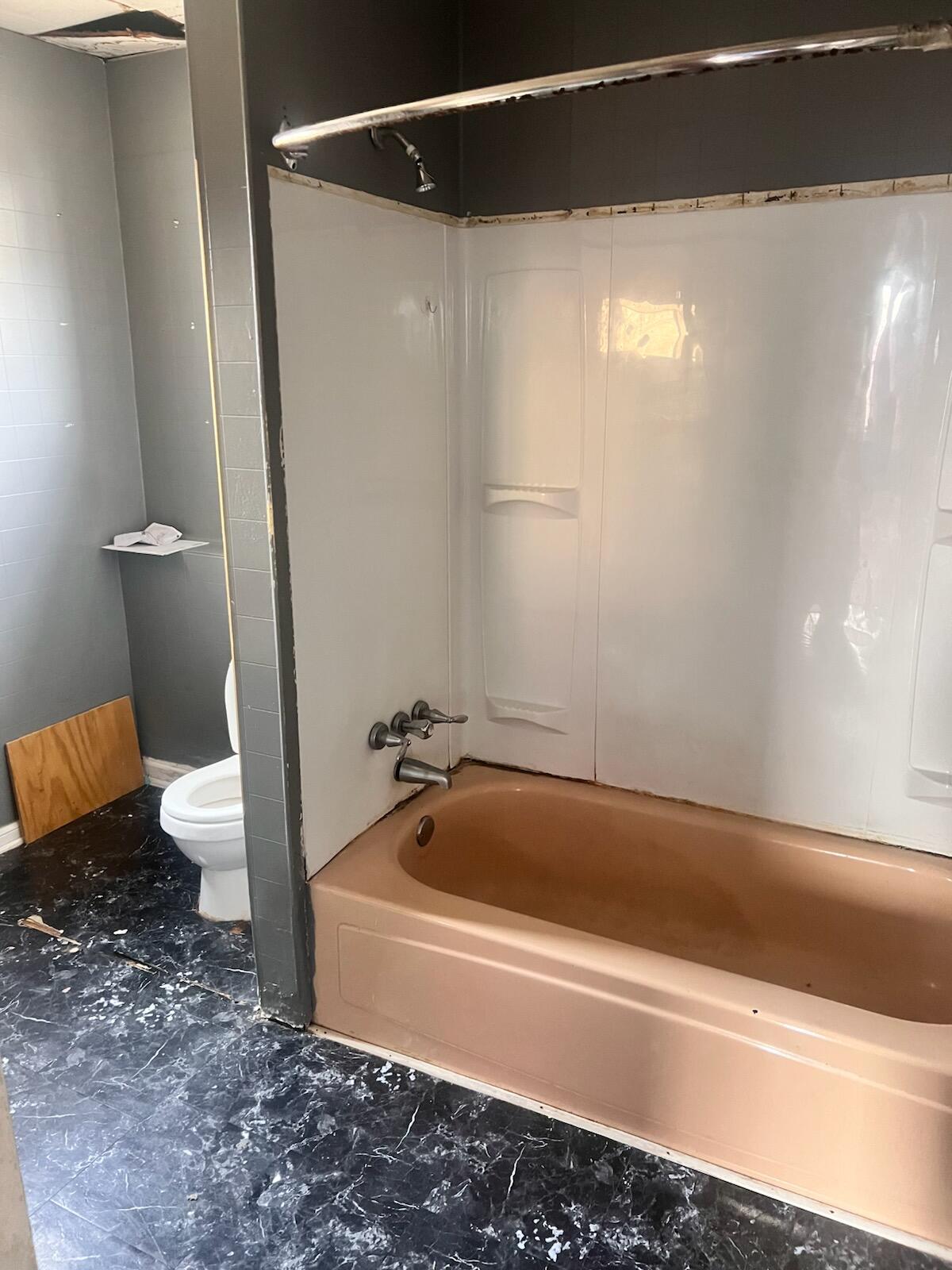 1618 Read Mountain Road Northeast Roanoke, VA 24019 - Photo 6 of 11 a bathroom with a bathtub and toilet