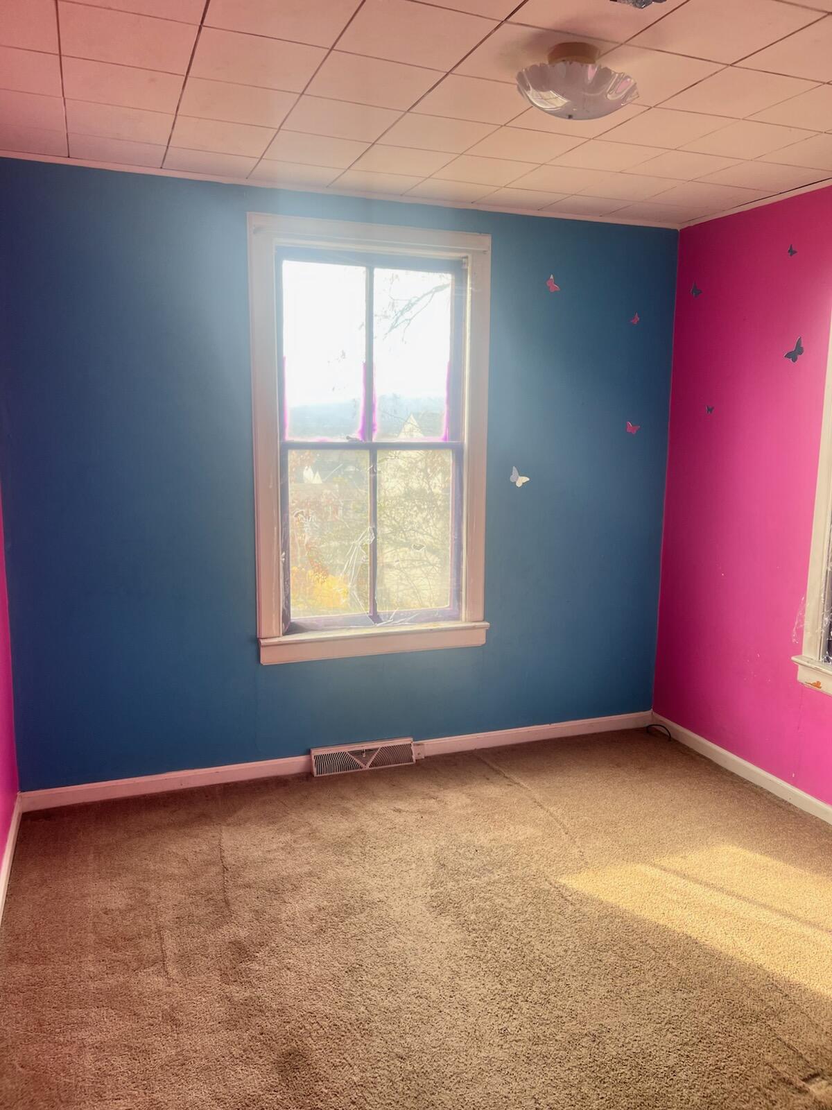 1618 Read Mountain Road Northeast Roanoke, VA 24019 - Photo 10 of 11 an empty room with a window