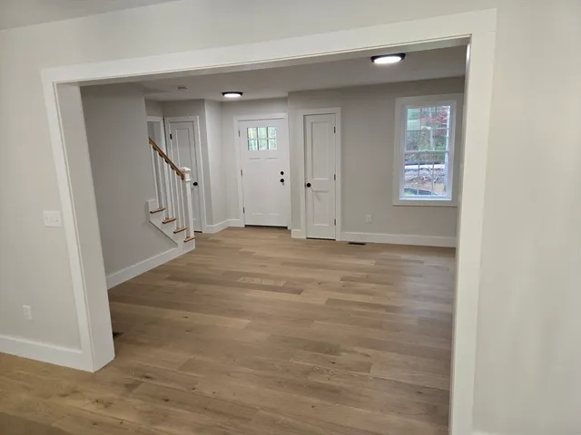 wooden floor and window in a room