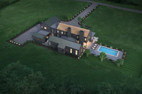 an aerial view of a house with a garden