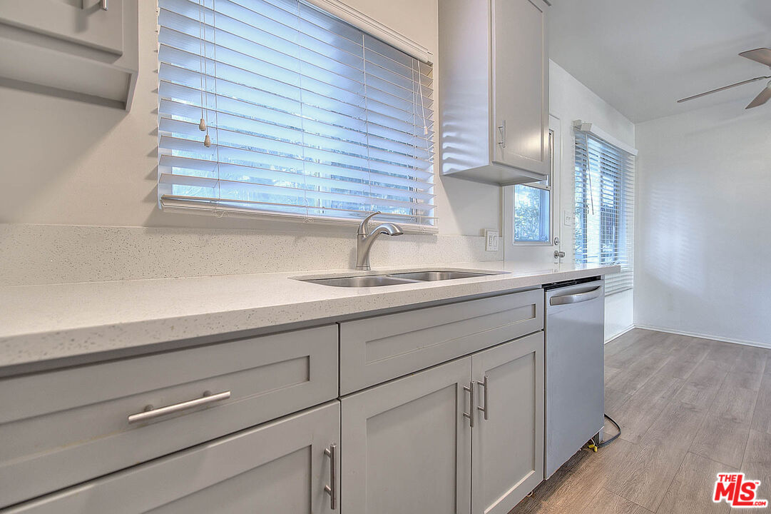 7017 Ramsgate Place Los Angeles, CA 90045 - Photo 17 of 32 a bathroom with a sink and a mirror