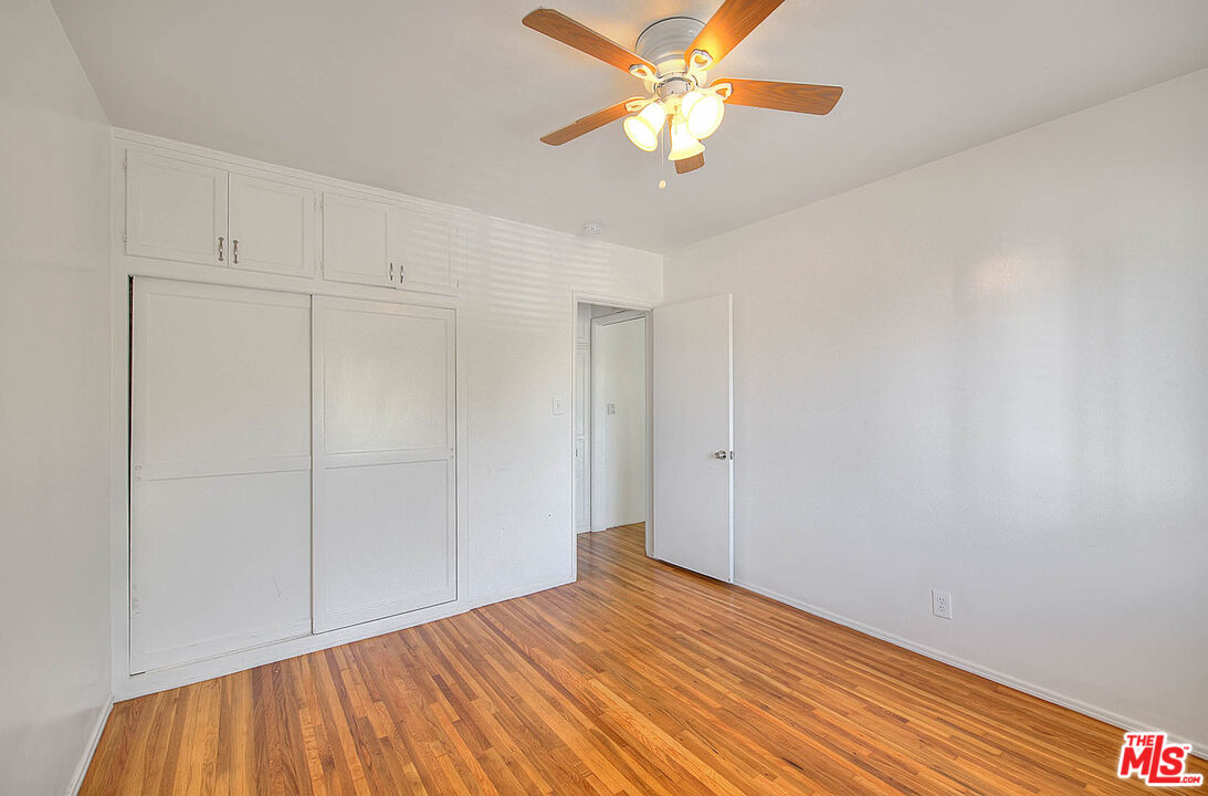 7017 Ramsgate Place Los Angeles, CA 90045 - Photo 22 of 32 a view of empty room with wooden floor