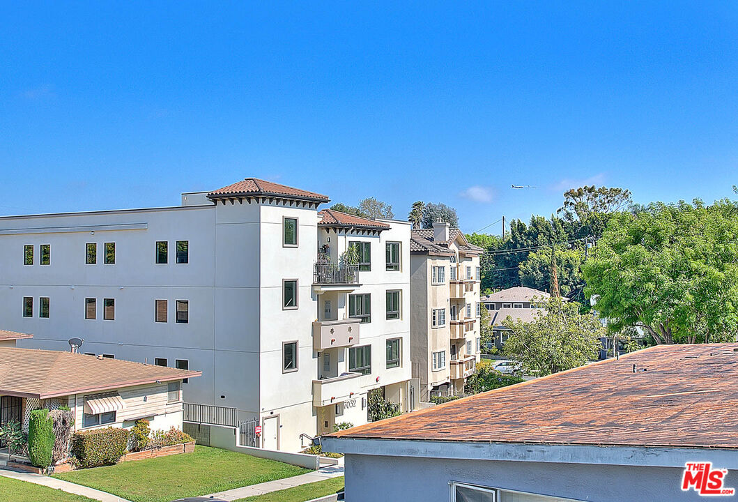 7017 Ramsgate Place Los Angeles, CA 90045 - Photo 32 of 32 a front view of a building with a yard