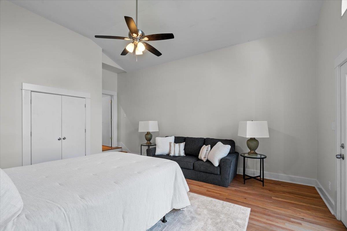 1682 Lawrence Avenue Memphis, TN 38112 - Photo 20 of 33 a bed room with a bed and a chandelier