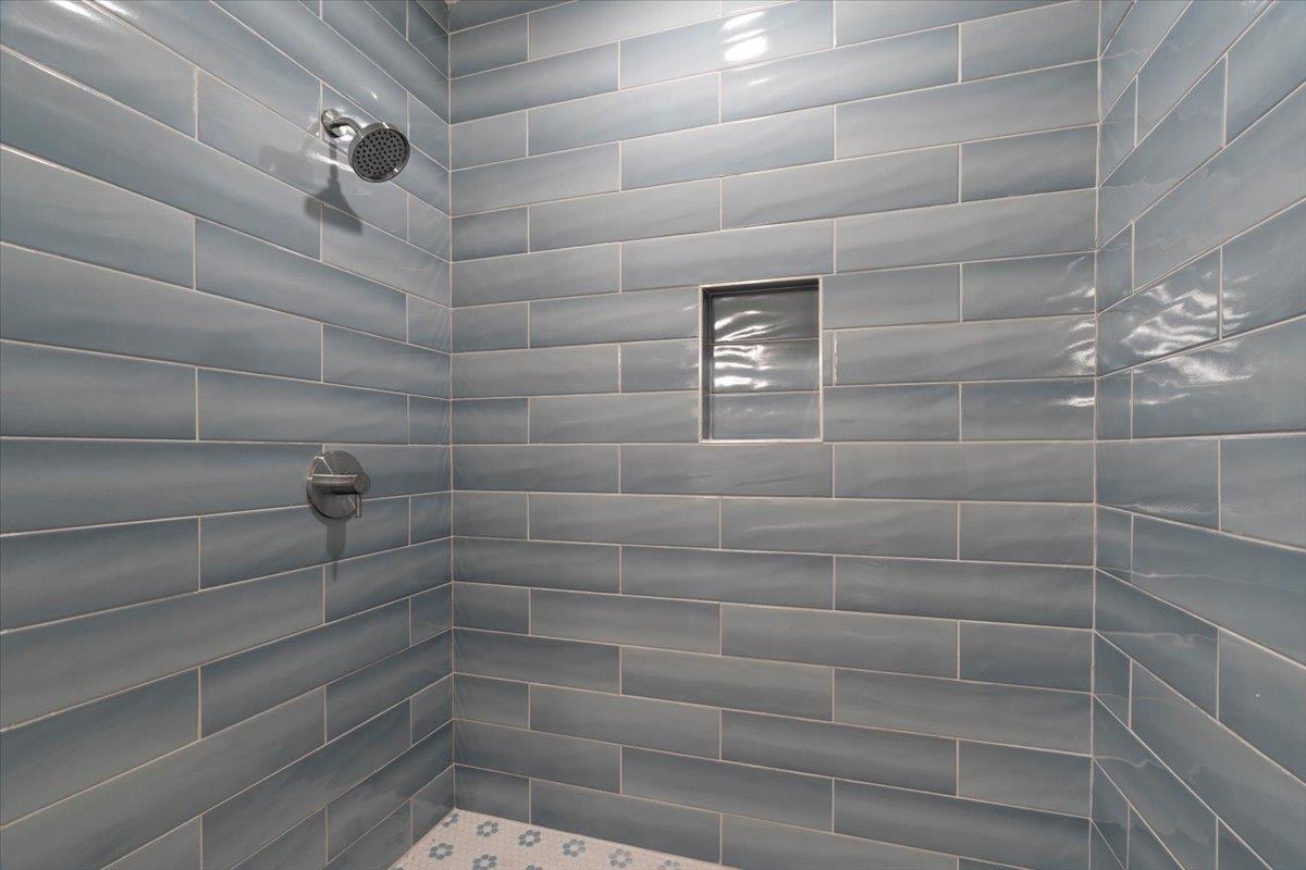 1682 Lawrence Avenue Memphis, TN 38112 - Photo 22 of 33 a bathroom with a shower