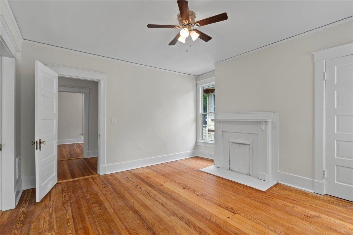 1682 Lawrence Avenue Memphis, TN 38112 - Photo 26 of 33 a view of empty room with wooden floor