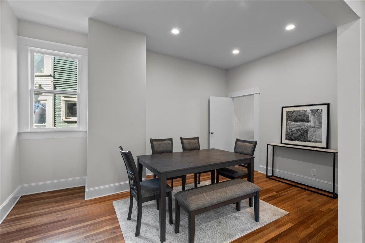 1682 Lawrence Avenue Memphis, TN 38112 - Photo 4 of 33 a dining room with furniture and wooden floor