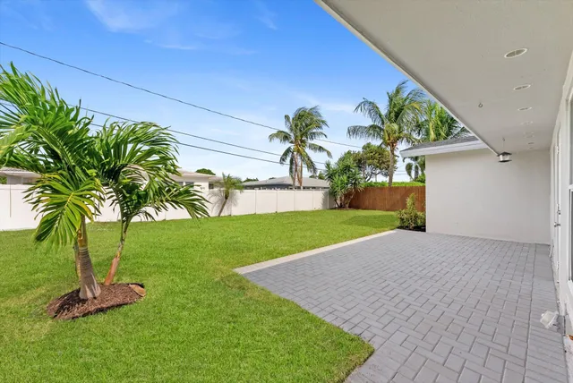 a view of a backyard with a garden