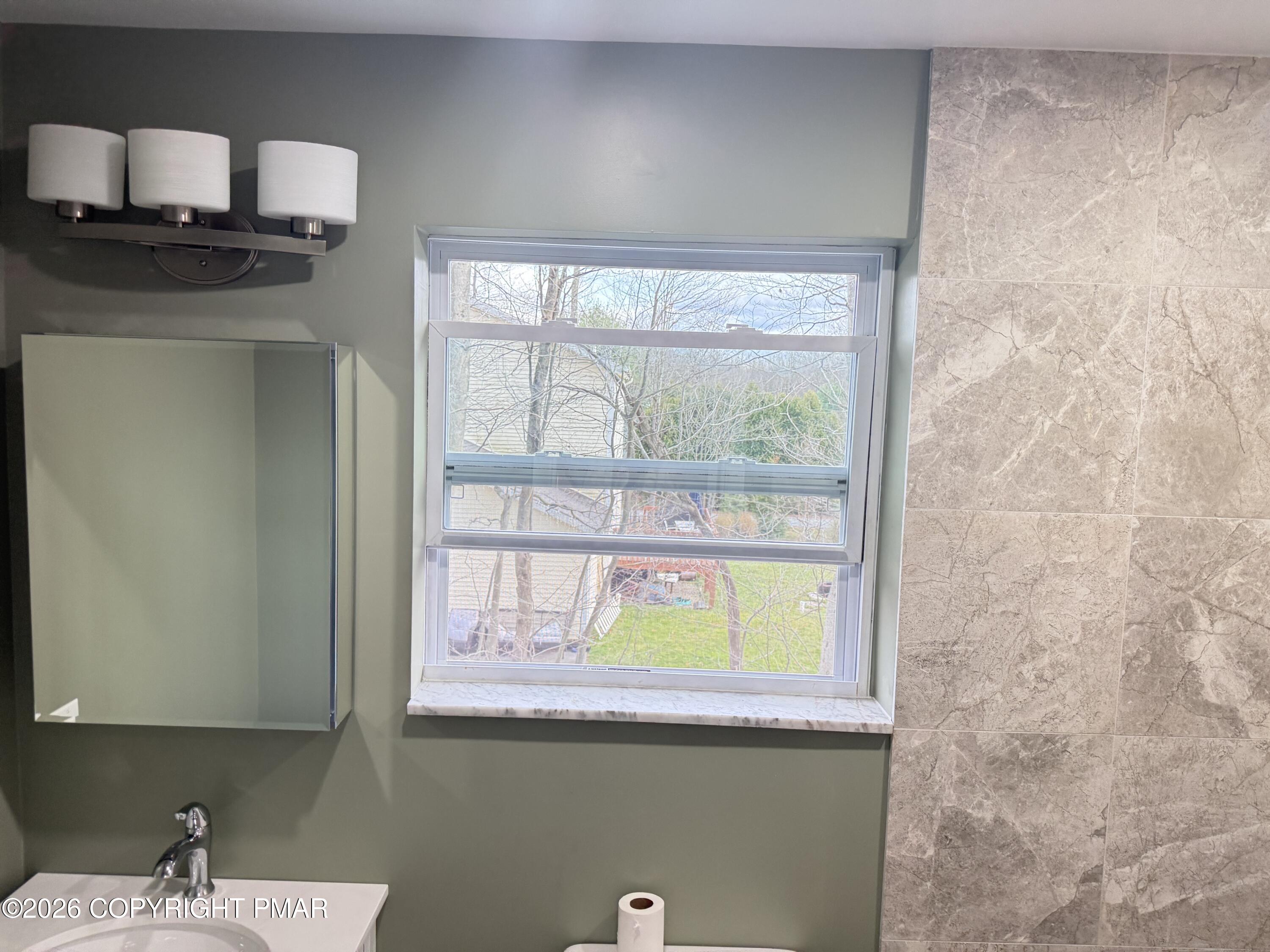 3106 Mohawk Trail Tobyhanna, PA 18466 - Photo 6 of 13 a kitchen with a sink and a window