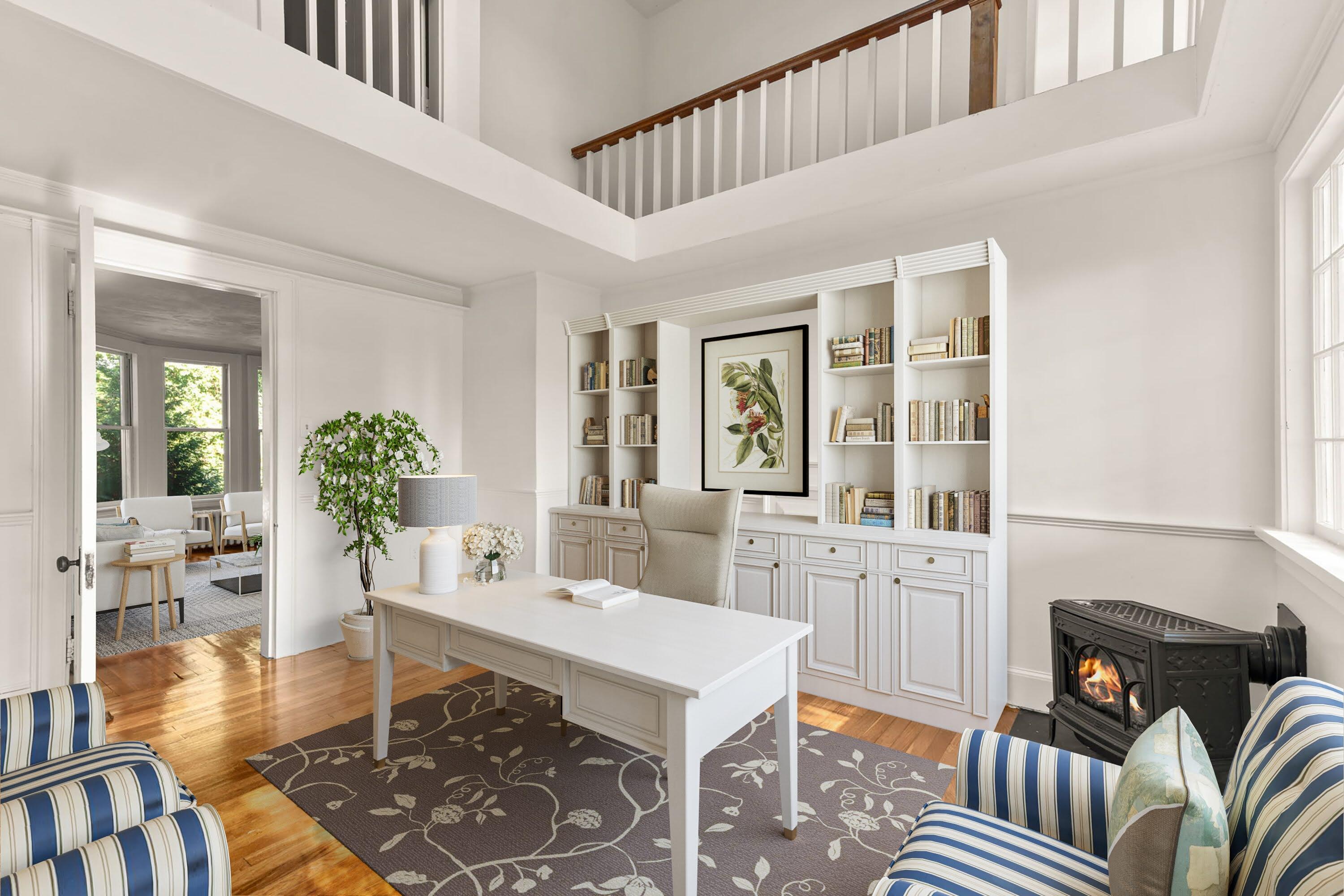 1208 County Road Cataumet, MA 02534 - Photo 17 of 40 a living room with furniture a fireplace and a table