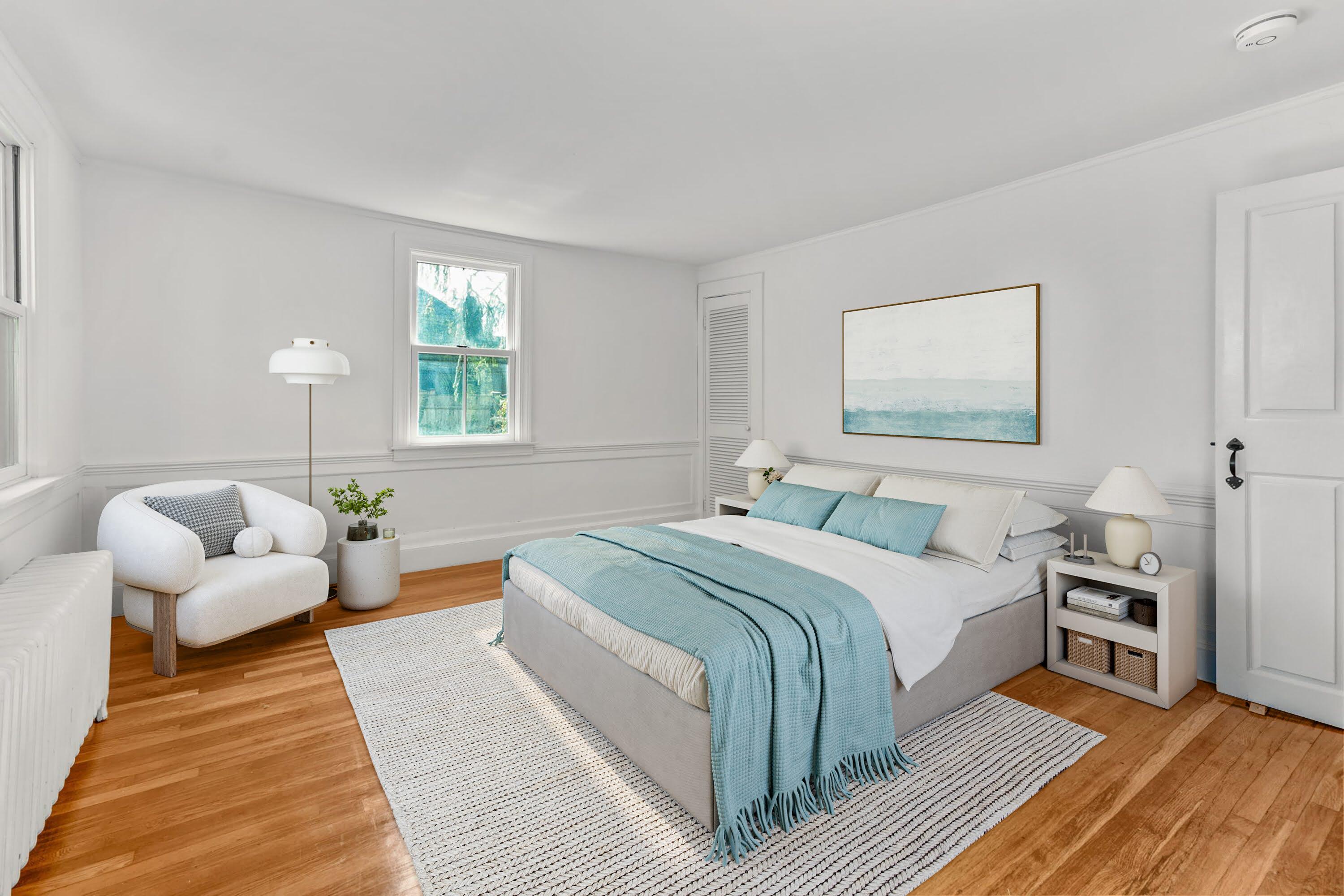 1208 County Road Cataumet, MA 02534 - Photo 19 of 40 a bedroom with a bed and furniture