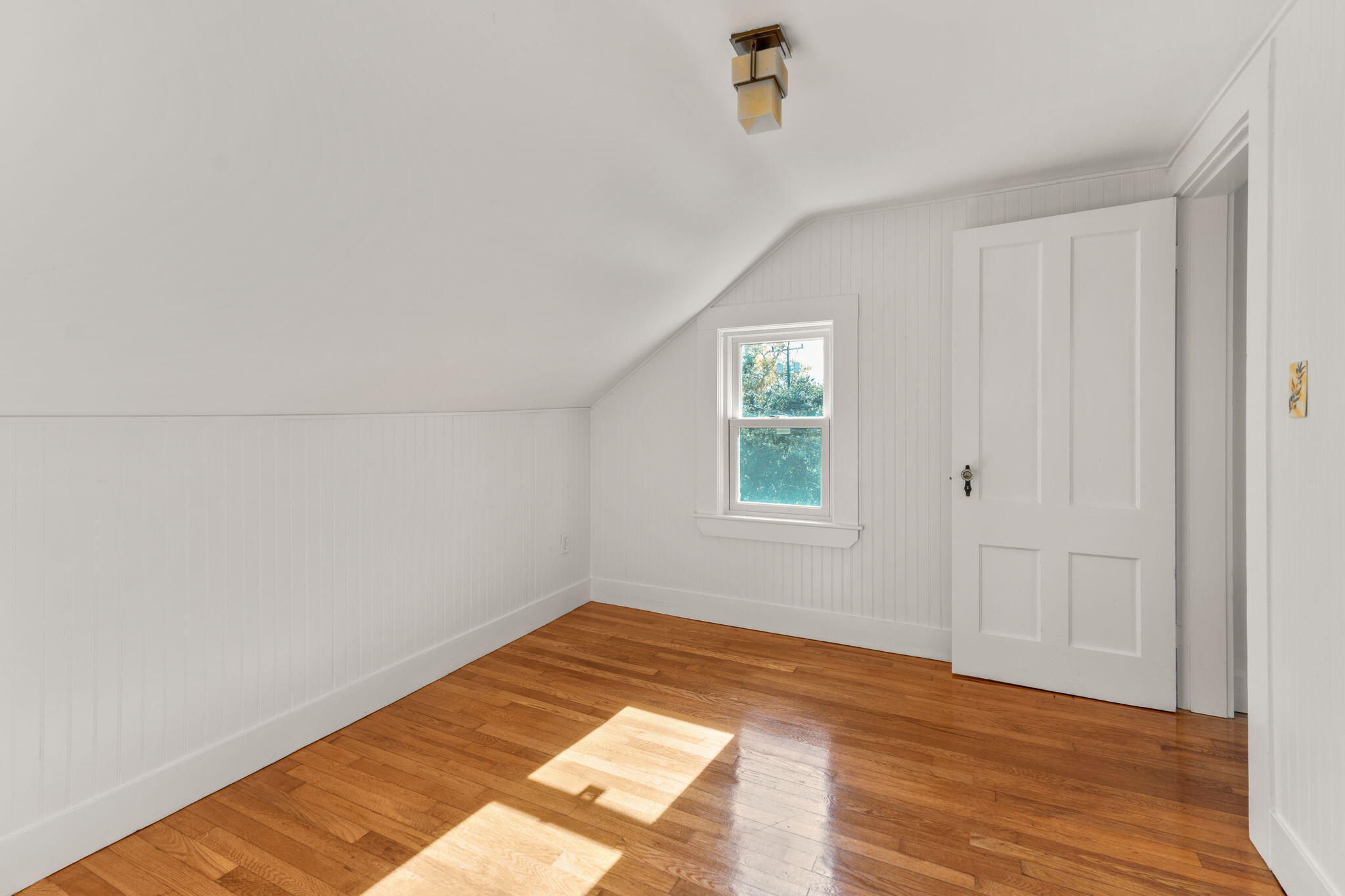 1208 County Road Cataumet, MA 02534 - Photo 21 of 40 a view of a room with wooden floor and window