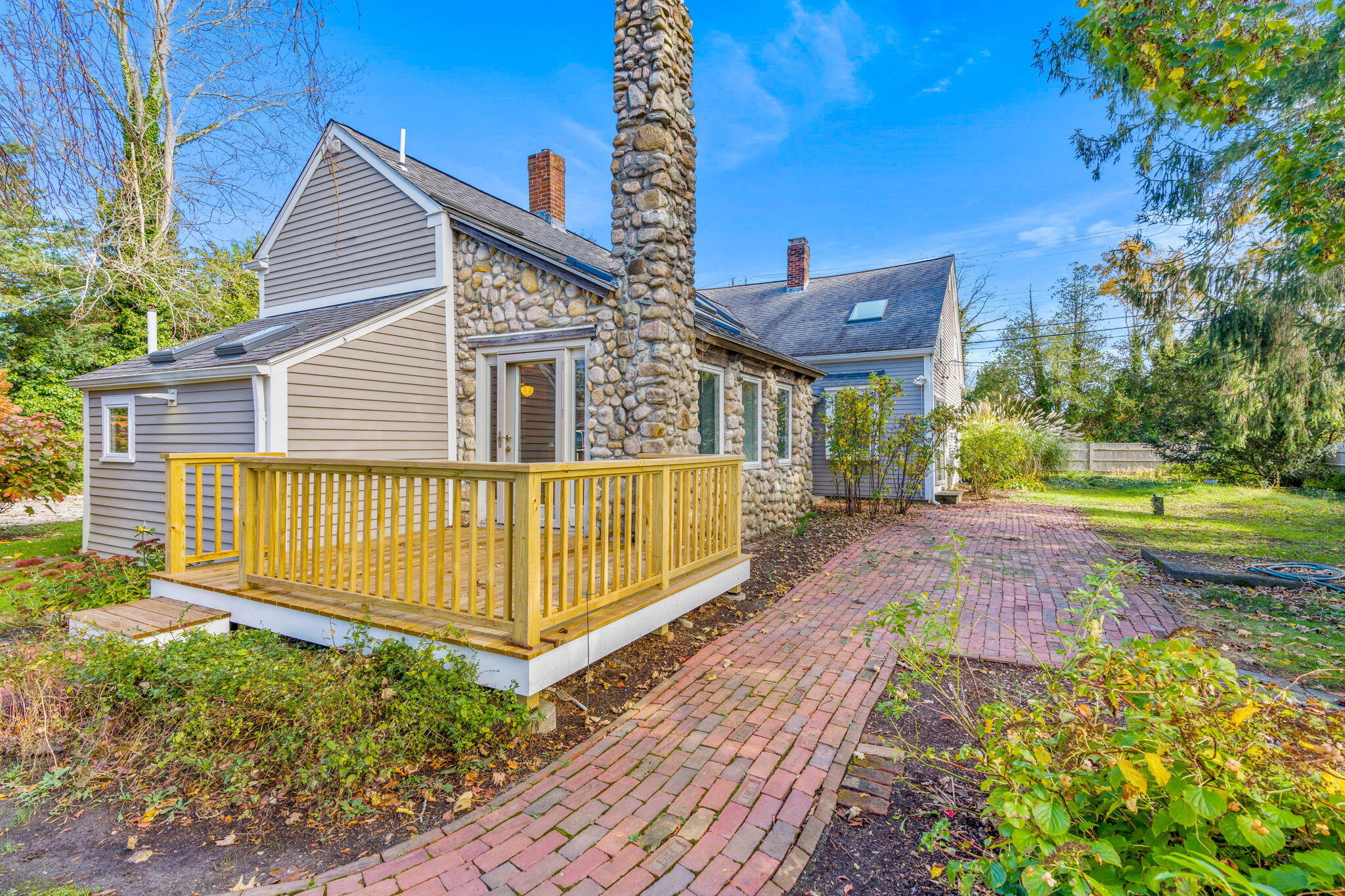 1208 County Road Cataumet, MA 02534 - Photo 26 of 40 a view of a house with a yard
