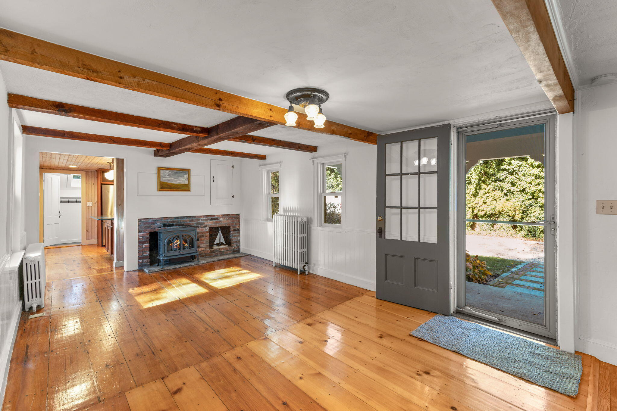 1208 County Road Cataumet, MA 02534 - Photo 3 of 40 a view of livingroom with furniture and a fireplace