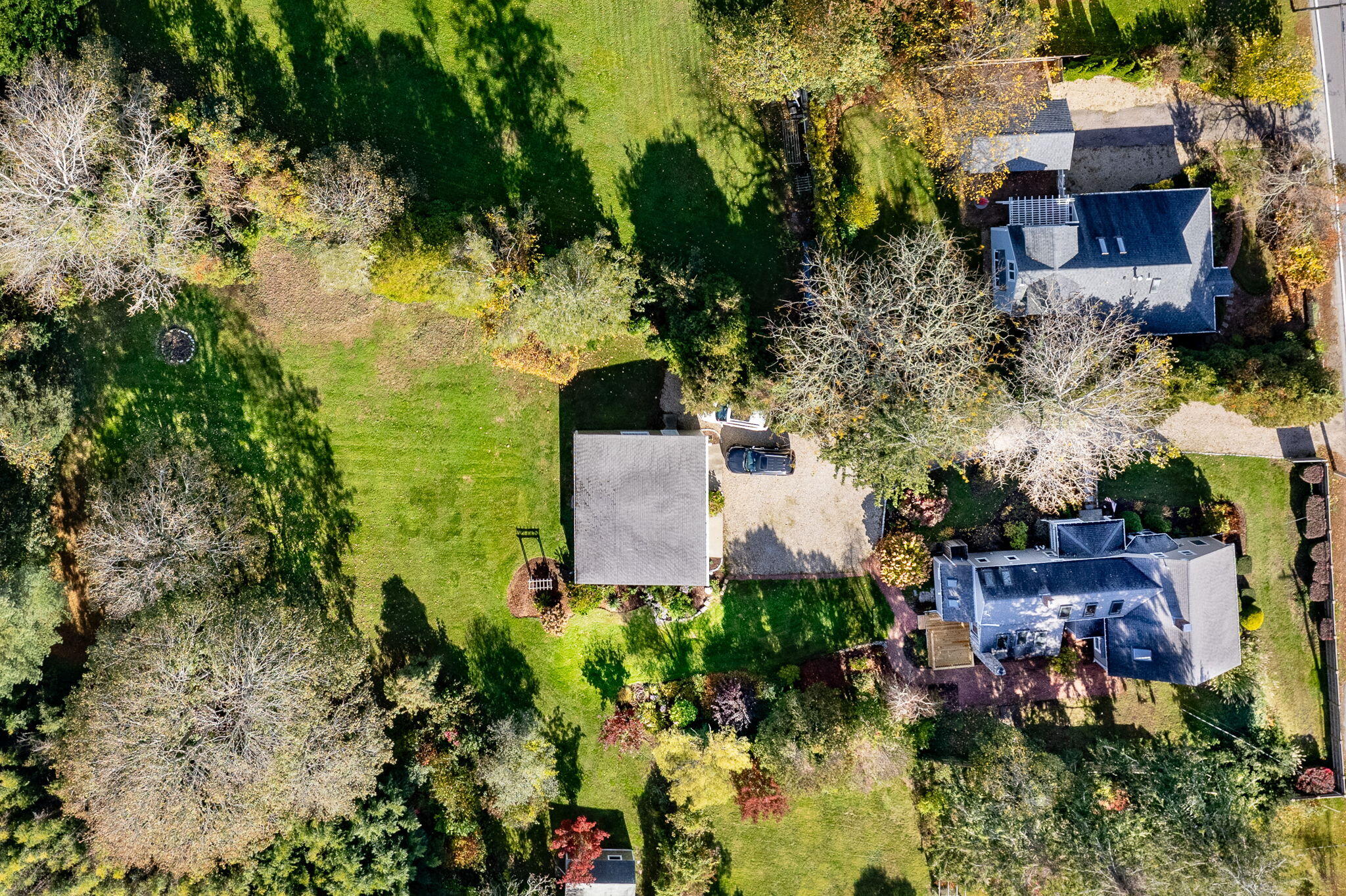 1208 County Road Cataumet, MA 02534 - Photo 37 of 40 an aerial view of residential house with outdoor space and trees all around