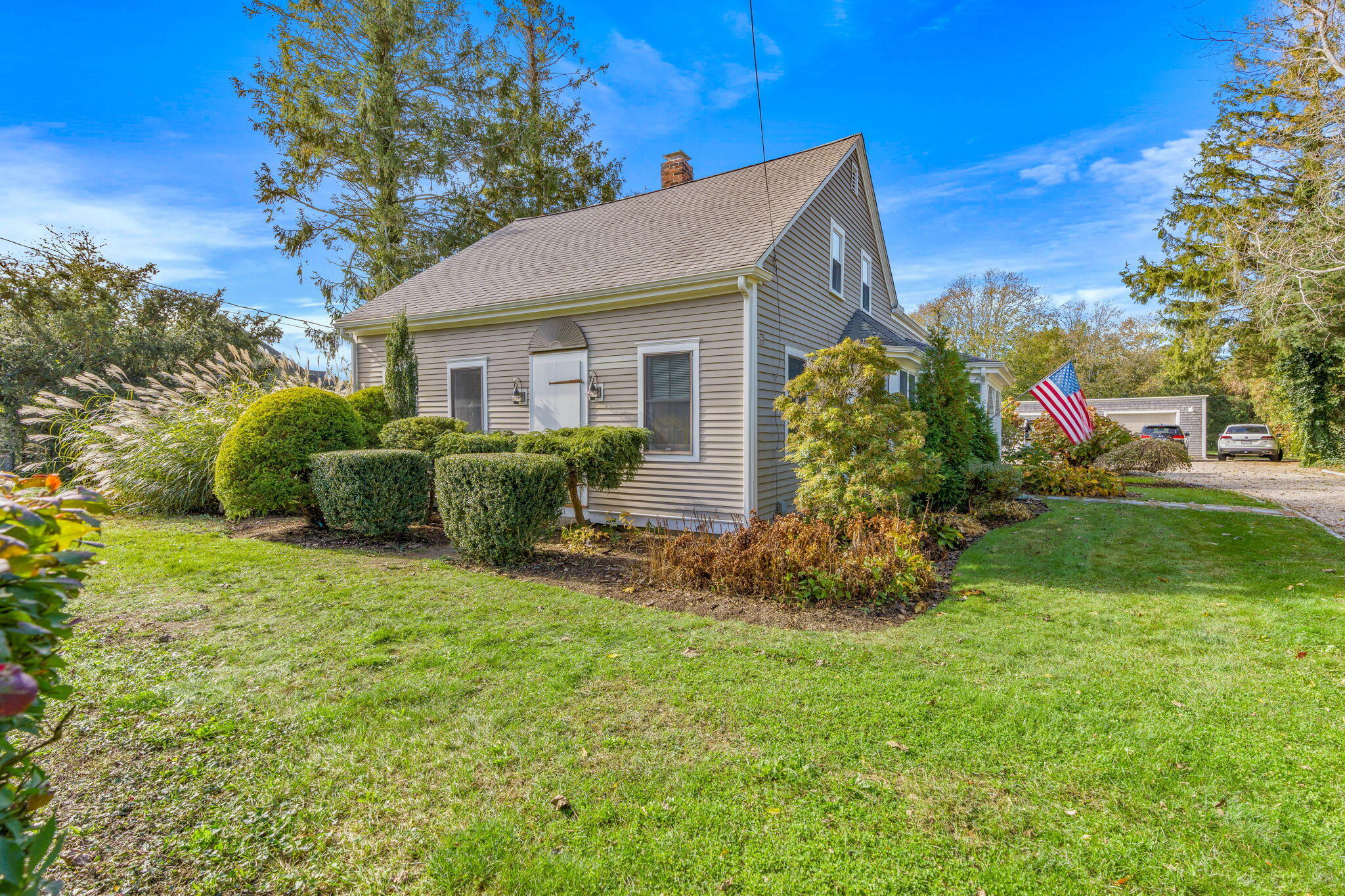 1208 County Road Cataumet, MA 02534 - Photo 38 of 40 a view of a house with a yard and garden