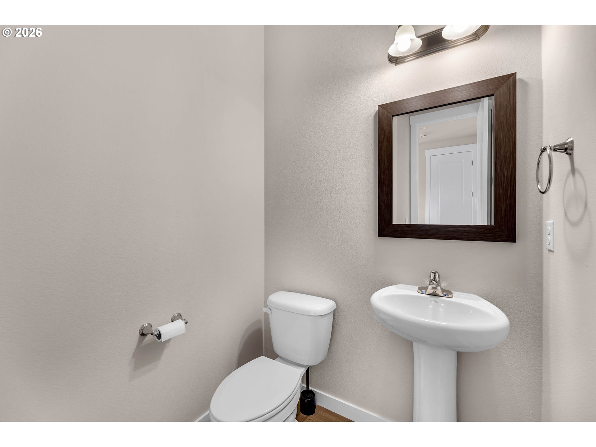 4308 Northeast 185th Street Vancouver, WA 98686 - Photo 20 of 41 a bathroom with a toilet sink and mirror
