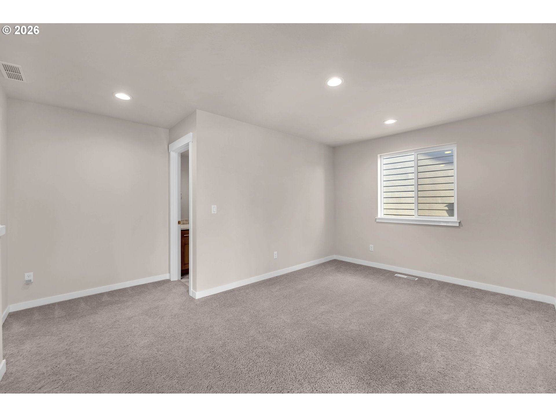 4308 Northeast 185th Street Vancouver, WA 98686 - Photo 24 of 41 a view of an empty room with a window
