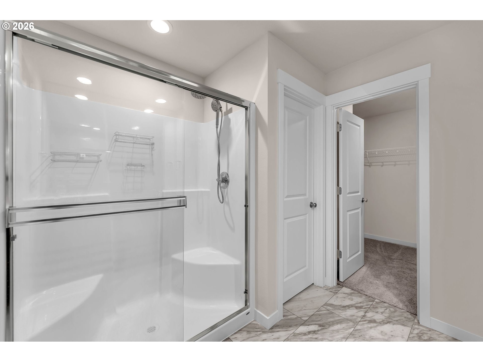 4308 Northeast 185th Street Vancouver, WA 98686 - Photo 29 of 41 a bathroom with a glass shower door