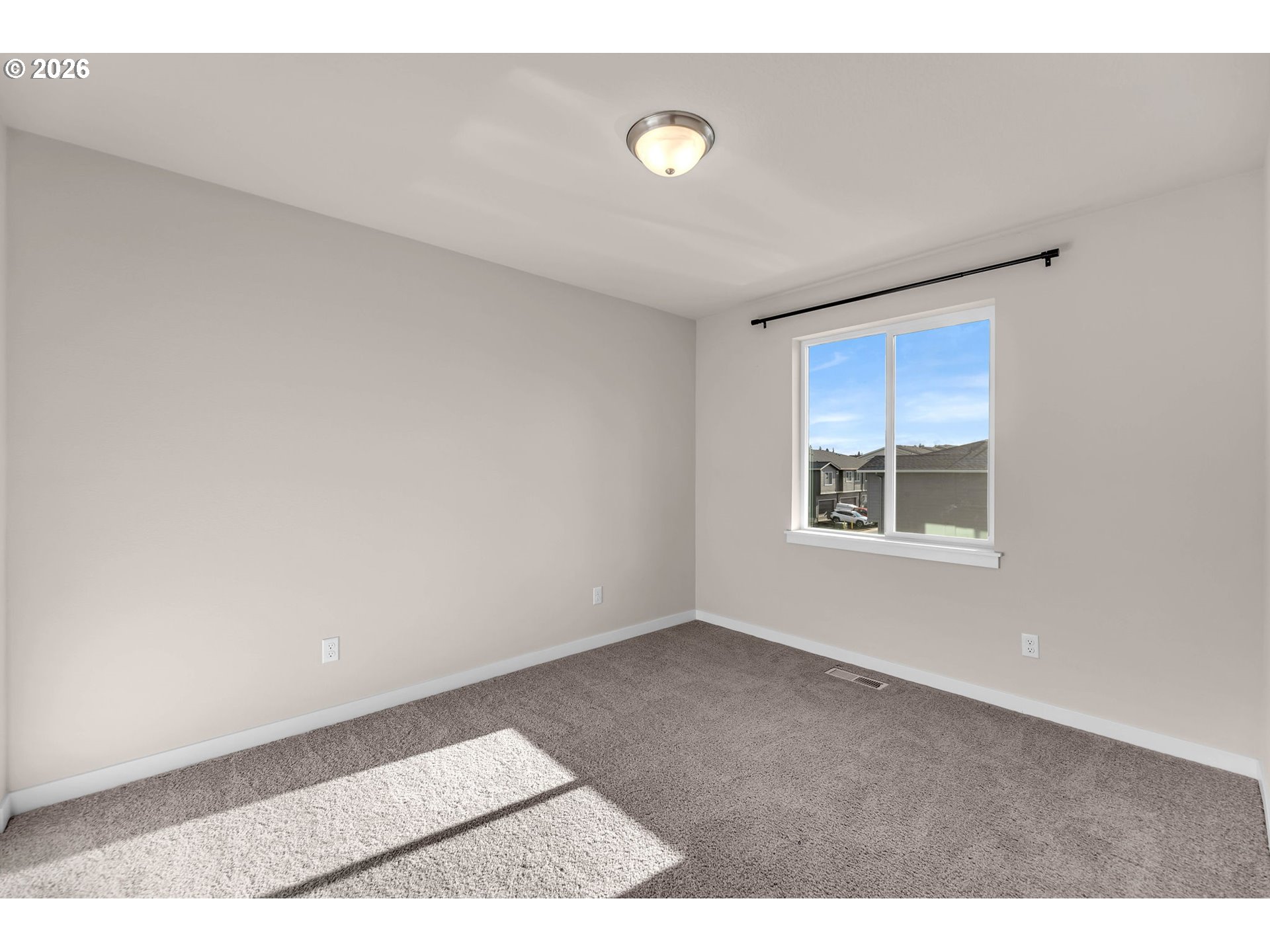 4308 Northeast 185th Street Vancouver, WA 98686 - Photo 33 of 41 a view of an empty room with a window