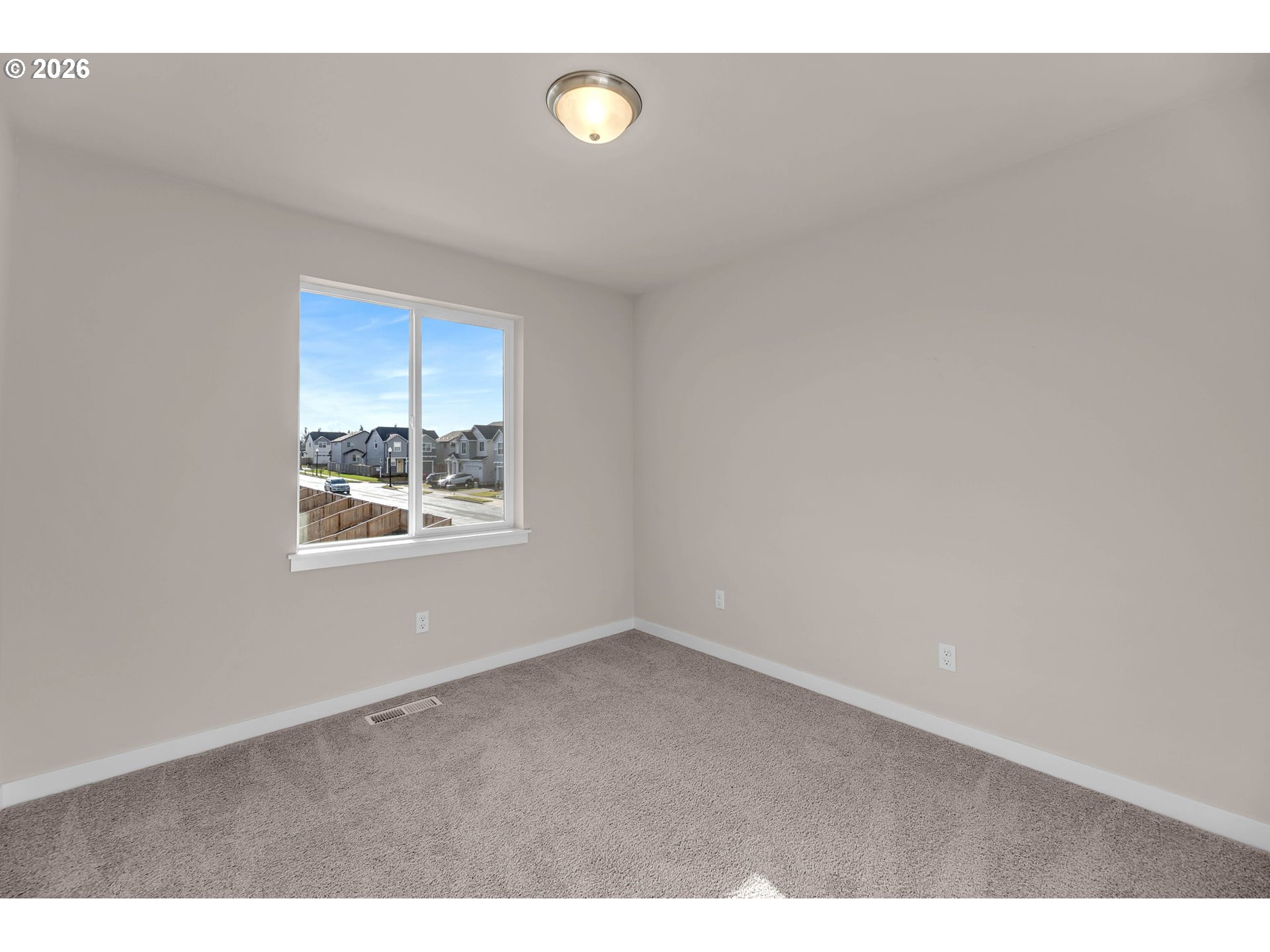 4308 Northeast 185th Street Vancouver, WA 98686 - Photo 35 of 41 a view of an empty room with a window