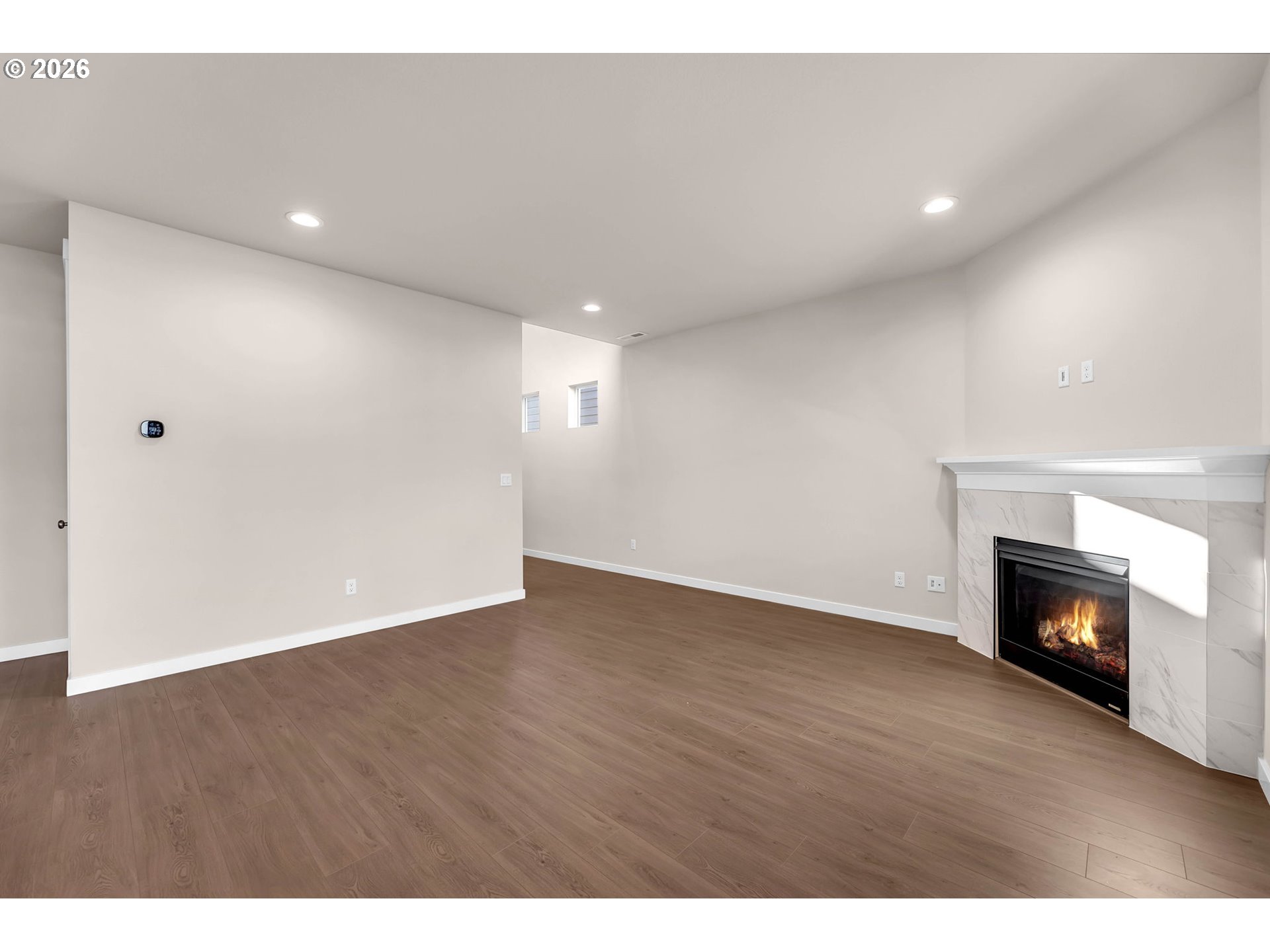 4308 Northeast 185th Street Vancouver, WA 98686 - Photo 8 of 41 a view of an empty room with a fireplace