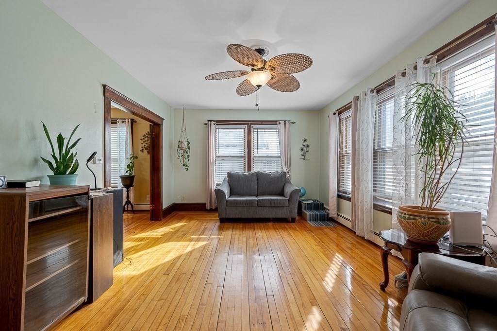 30 Draper Road Gardner, MA 01440 - Photo 11 of 41 a living room with furniture and a large window