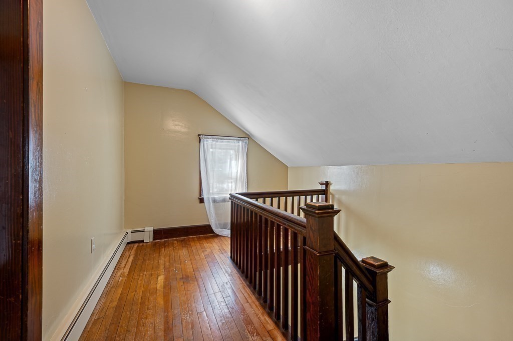 30 Draper Road Gardner, MA 01440 - Photo 21 of 41 a view of a hallway with wooden floor and staircase