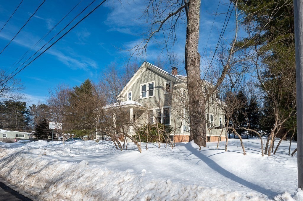 30 Draper Road Gardner, MA 01440 - Photo 40 of 41 a view of a house with a yard covered in snow