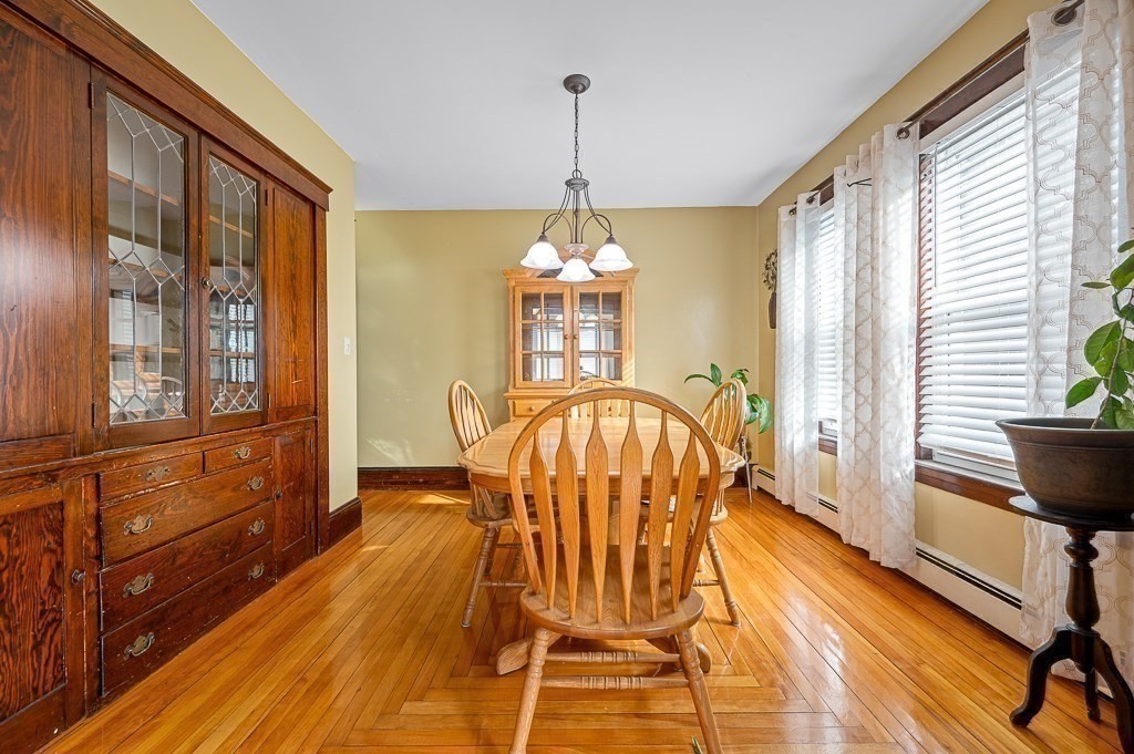 30 Draper Road Gardner, MA 01440 - Photo 9 of 41 a view of a dining room with furniture window and wooden floor