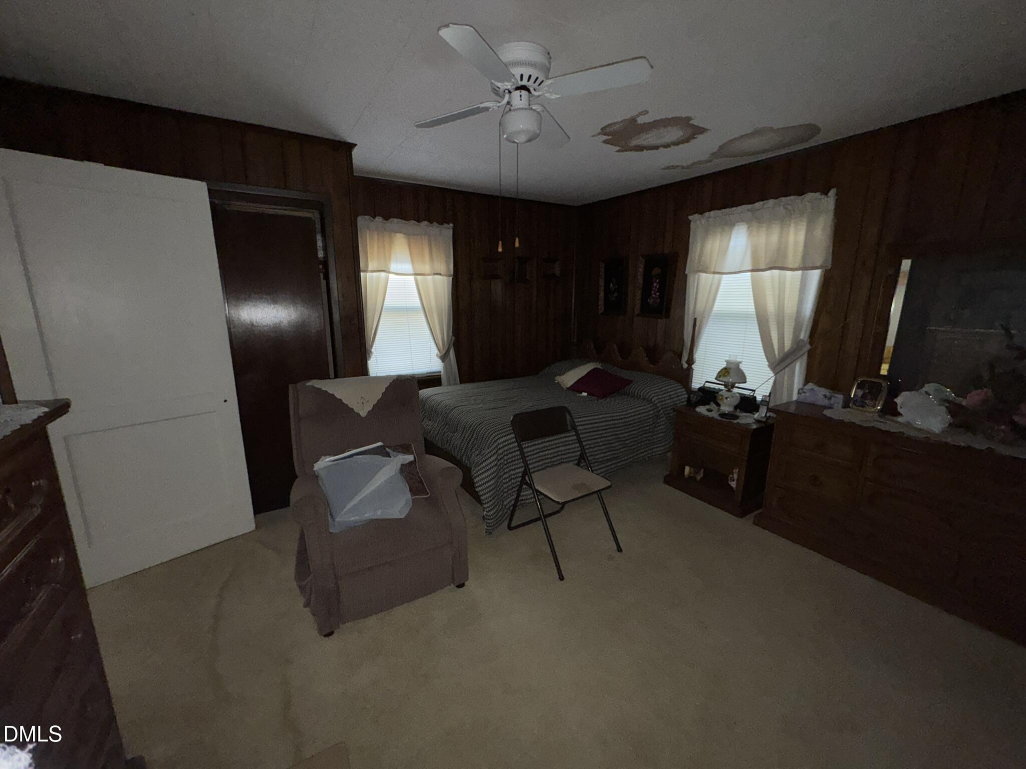 213 Hill Street Roxboro, NC 27573 - Photo 6 of 13 a living room with furniture and a window