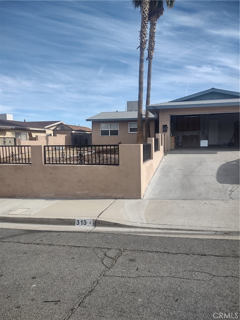313 Muir Street Barstow, CA 92311 - Photo 2 of 9 a view of a terrace